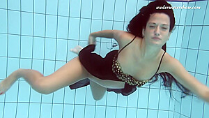 Gypsy Black Haired Babe Swimming Underwater