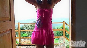 Cute Carla does a striptease for the camera