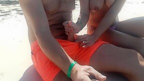 On The Beach, A Stranger Gives A Handjob In Public